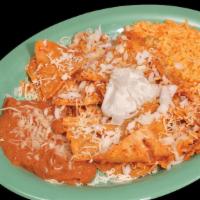 Chilaquiles Rojos O Verdes · Crispy tortilla chips topped with your choice of green tomatillo or red mild sauce.
