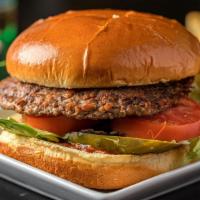 Deluxe Hamburger (1/4 Lb) · Pure-beef made-to-order burgers served on a toasted bun, mustard, ketchup, grilled onions, p...