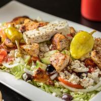 Grecian Chicken Breast Salad · Grecian salad topped with grecian-marinated grilled chicken breast.