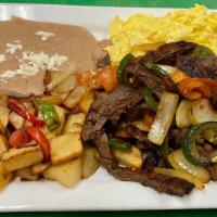 Desayuno Macho'S · Grilled steak with tomatoes, onions, jalapeno pepper and 2 scrambled eggs.
