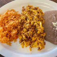 Huevos Con Chorizo · Two scrambled eggs with mexican sausage