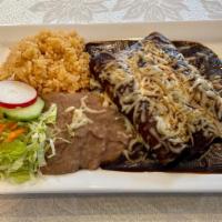 Enchiladas (Verdes, Rojas O Mole) · Three enchiladas with melted cheese, onion and sour cream.