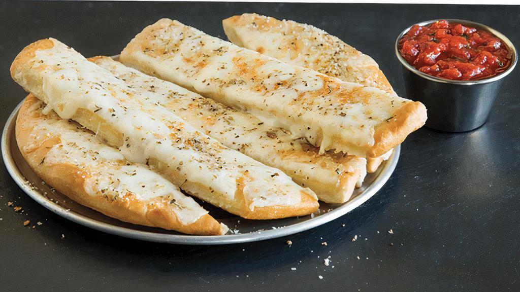 Cheesy Breadstix · Our standard breadstix just got cheesy! Each one is topped with plenty of mozzarella cheese that will melt in your mouth. 8 inch.