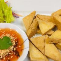 Fried Tofu · Deep fried tofu, served with homemade sweet and sour sauce and ground peanuts.