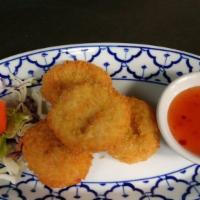 Tod Mun Goong · Deep fried ground shrimp patties mixed with delicious seasoning, served with sweet and sour ...