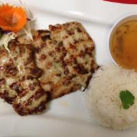 Thai Grilled Chicken · Chicken breast marinade Thai style grilled. Served with steam broccoli, steam carrot and chi...