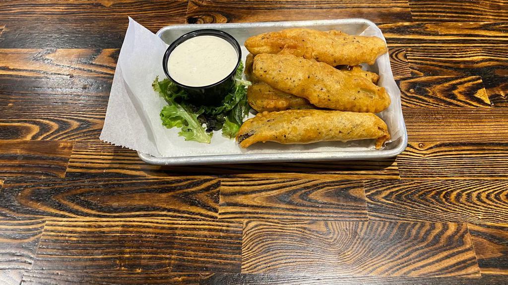 Fried Pickles · Crunchy and delicious. Five hand-battered spears deep-fried to  crispy perfection. Side of Ranch mix for dipping.