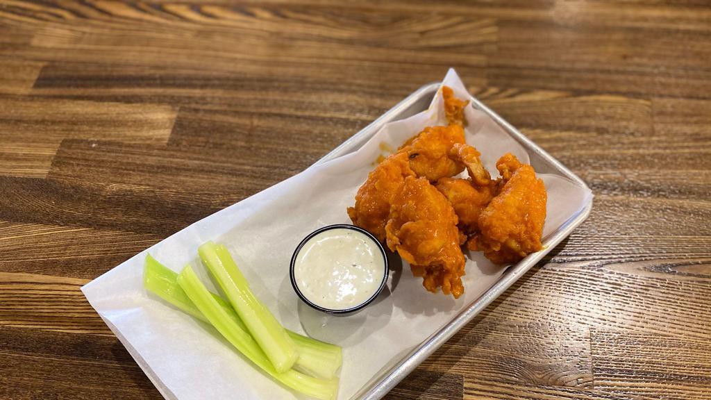 Boneless Wings · Hand-battered and fried. Available in three sizes with choice of sauce or dry rub.