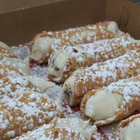 Cannoli · Individual Italian dessert with a creamy filling and crunchy shell.