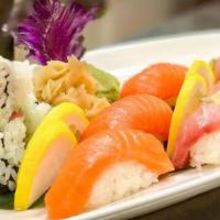 American Deluxe Sushi · Three pieces each, tuna, yellowtail, salmon, and one tuna avocado roll.