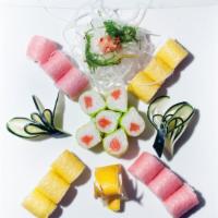 Maki Platter · Salmon, tuna roll, and yellowtail roll with special three color soybean paper.