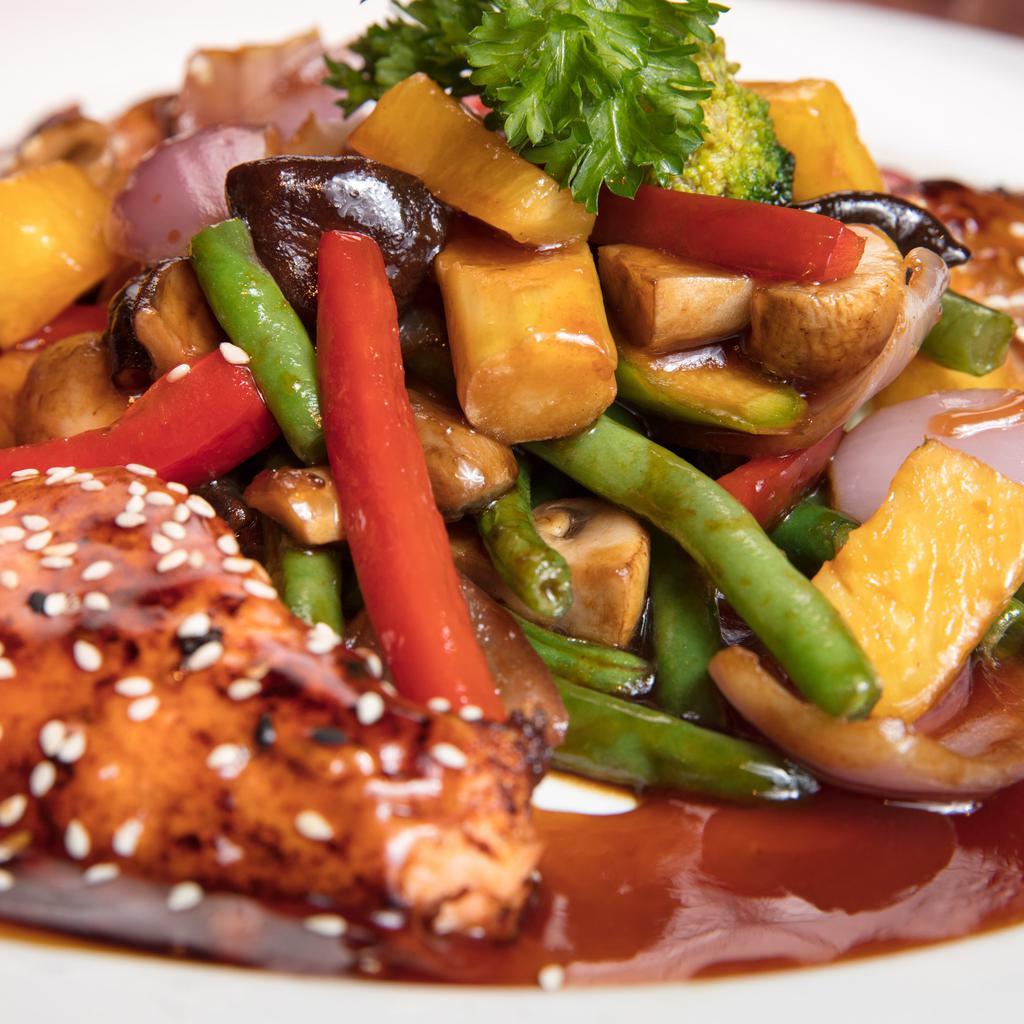 Sesame Crusted Salmon · Fresh grilled salmon served with Asian mix veg (four pieces salmon).