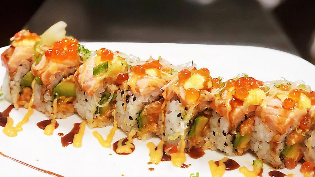 Crazy' Salmon Roll · In: spicy salmon, avocado, chill sauce. Out: fresh salmon, mayon, eel sauce, spicy mayon, scallion, ikura on top.