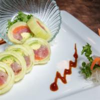 Perfect Naruto · Inside;salmon, tuna, yellowtail, avocado, out;  rolled in thinly sliced  cucumber.