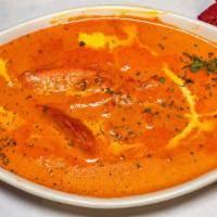 Butter Chicken · Delicious marinated boneless chicken thigh pieces roasted in tandoor oven and cooked with ch...