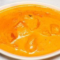 Chicken Tikka Masala · Delicious marinated boneless chicken breast pieces roasted in tandoor oven and cooked with c...