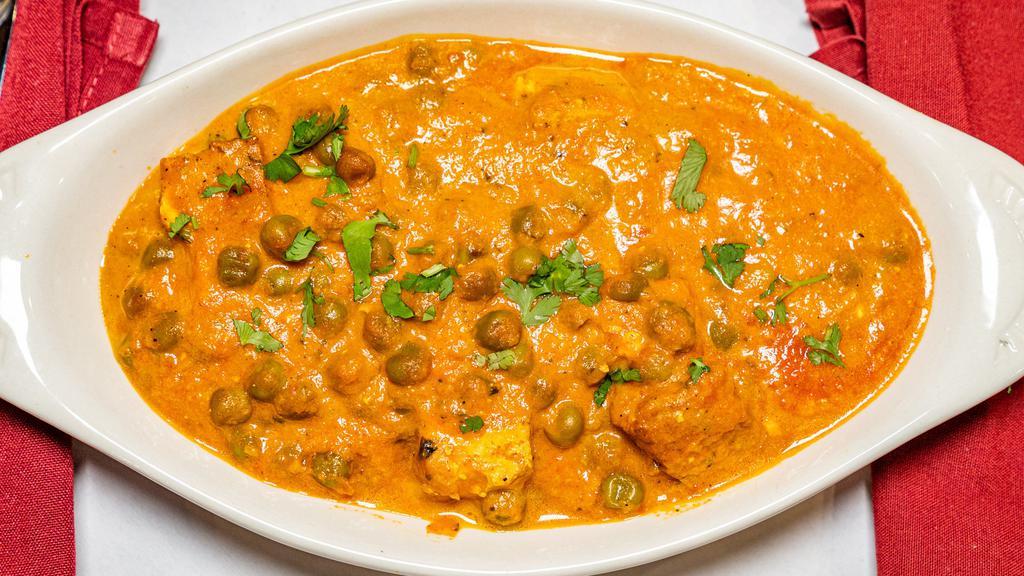 Mattar Paneer · Delicious house special homemade cottage cheese cubes cooked in creamy sauce with green peas.