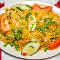 Vegetarian Table Biryani · Basmati rice cooked with fresh vegetables and aromatic spices.
