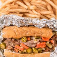 Italian Beef · Italian beef topped with your choice of mild or hot peppers and your choice of cheese and to...