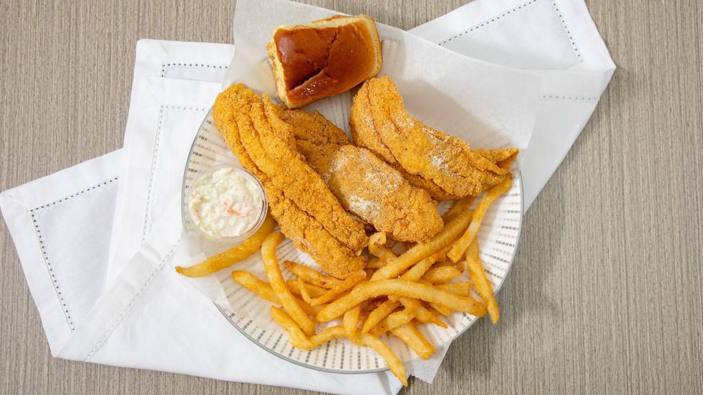 Catfish Fillet Sandwich · Catfish topped with American cheese, tarter sauce, tomatoes, and lettuce.
