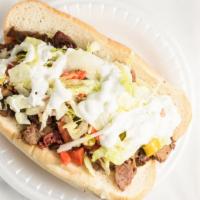 Gym Shoe · Italian beef, gyro meat, and corn beef with provolone cheese, lettuce, tomatoes, giardiniera...