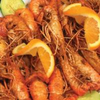 Langostinos · Prawns sautéed in our spicy house seasoning.
