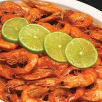 Cucarachas · Flash fried shell on shrimp in a spicy sauce.