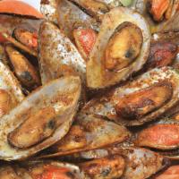 Mejillones · Mussels sautéed in our spicy house seasoning.