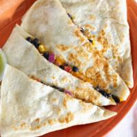 Meat Quesadilla · Flour tortilla filled with cheese and your choice of meat served with pico de gallo, lettuce...