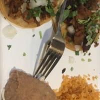 2 Tacos Rice & Beans (Tacos Special Original) · Corn or flour tortilla topped with cilantro, onions, and your choice of meat. Side of rice a...