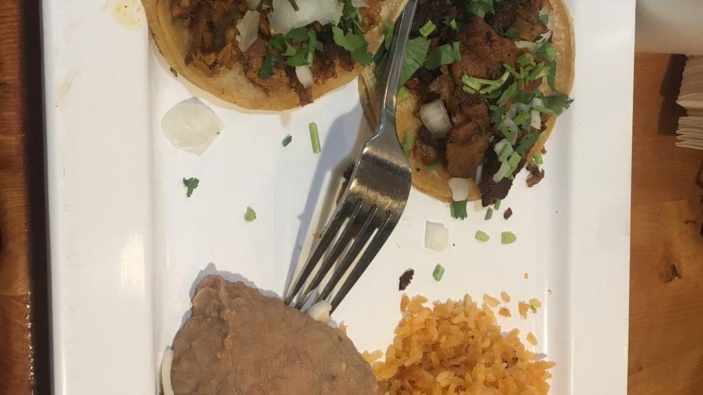 2 Tacos Rice & Beans (Tacos Special Original) · Corn or flour tortilla topped with cilantro, onions, and your choice of meat. Side of rice and beans.