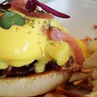 Classic Benedict · Poached eggs, smoked pork loin on an English muffin, and topped with Hollandaise.