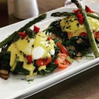 Florence Benedict · Toasted English muffin, poached egg, baby spinach, fresh mushrooms, bell peppers, and aspara...