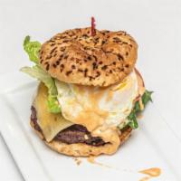 The Famous Pete'S Burger · Seasoned 1/2 lb. non-filled Angus beef, topped with American & Swiss cheese, apple smoked ba...
