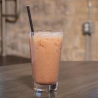 Iced Dirty Vanilla Chai Latte · 2 Shots Espresso, Milk, Masala Chai, Vanilla Syrup