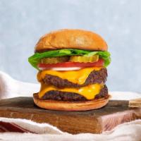 Double Team Cheese Burger · Two American beef patties topped with melted cheese, lettuce, tomato, onion, and pickles. Se...