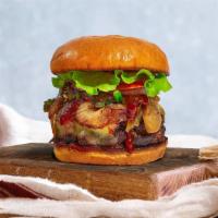 Bbq Bliss Burger · American beef patty topped with melted cheese, barbecue sauce, lettuce, tomato, onion, and p...