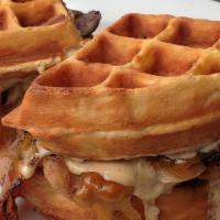 Fried Chicken Waffle Sandwich · All-white meat chicken, lightly breaded, and deep-fried to perfection. Topped with bacon bet...
