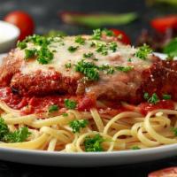 Chicken Parmesan Pasta · All-white meat chicken, lightly breaded, atop a bed of fettuccini, covered with marinara, an...