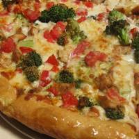 Chicken Alfredo Pizza · Chicken breast, fresh broccoli, garlic, tomato, and alfredo sauce. No tomato sauce.