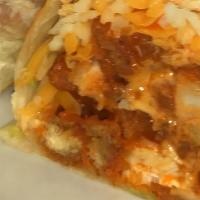 Buffalo Chicken Burrito  · Chicken tender tossed with Buffalo sauce, topped with cheddar and Monterey Jack cheeses, chi...