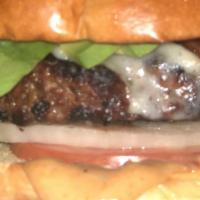 Bacon Avocado Burger  · Worcestershire, Wisconsin Swiss cheese, 2 strips of hickory-smoked bacon, avocado, tomato, o...