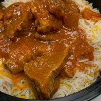 Lamb Curry Bowl · Lamb curry on a bed of rice