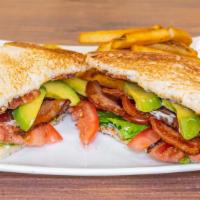 Avocado Blt · Choice of toasted bread, thick slices of corn cob, smoked country bacon, and avocado.