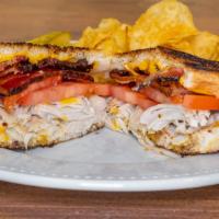 Grilled Turkey Bacon Club Melt · Our fresh roasted thanksgiving turkey with corn cob smoked country bacon, tomato slice with ...