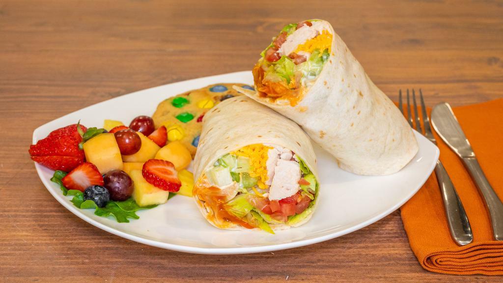 Buffalo Chicken Wrap · Roasted chicken breast, romaine lettuce, celery, tomatoes, Cheddar cheese, buffalo hot sauce, and a choice of ranch or blue cheese dressing.