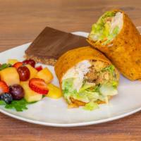 Chicken Caesar Wrap · Roasted chicken breast, romaine lettuce, shaved Parmesan cheese, homemade croutons, and our ...