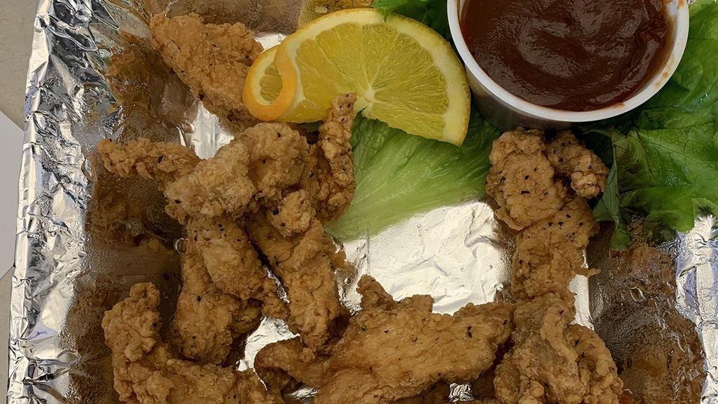 Chicken Strips · Six juicy chicken tenderloins lightly breaded and served with your choice of homemade BBQ, honey mustard, or our house red sauce.
