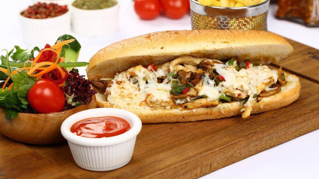 Mushroom Chicken Philly Steak Sandwich · Delicious juicy chicken philly steak sandwich made with mushrooms, caramelized onions, bell peppers, and provolone cheese.