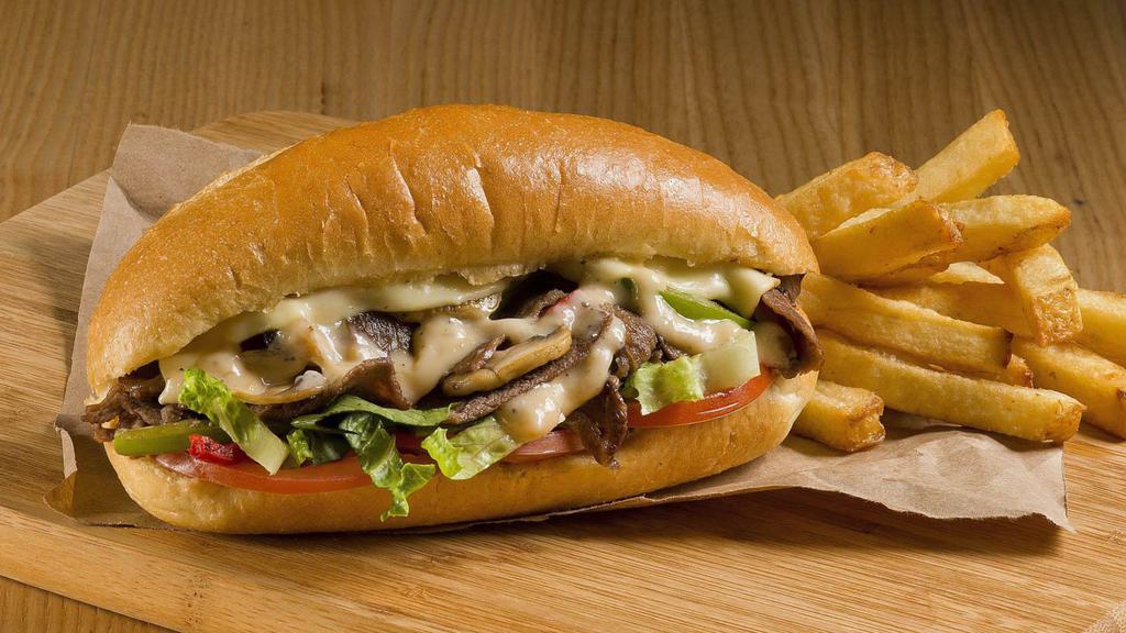 Bbq Chicken Philly Steak Sandwich · Delicious juicy buffalo chicken philly steak sandwich made with caramelized onions, bell peppers, and provolone cheese.